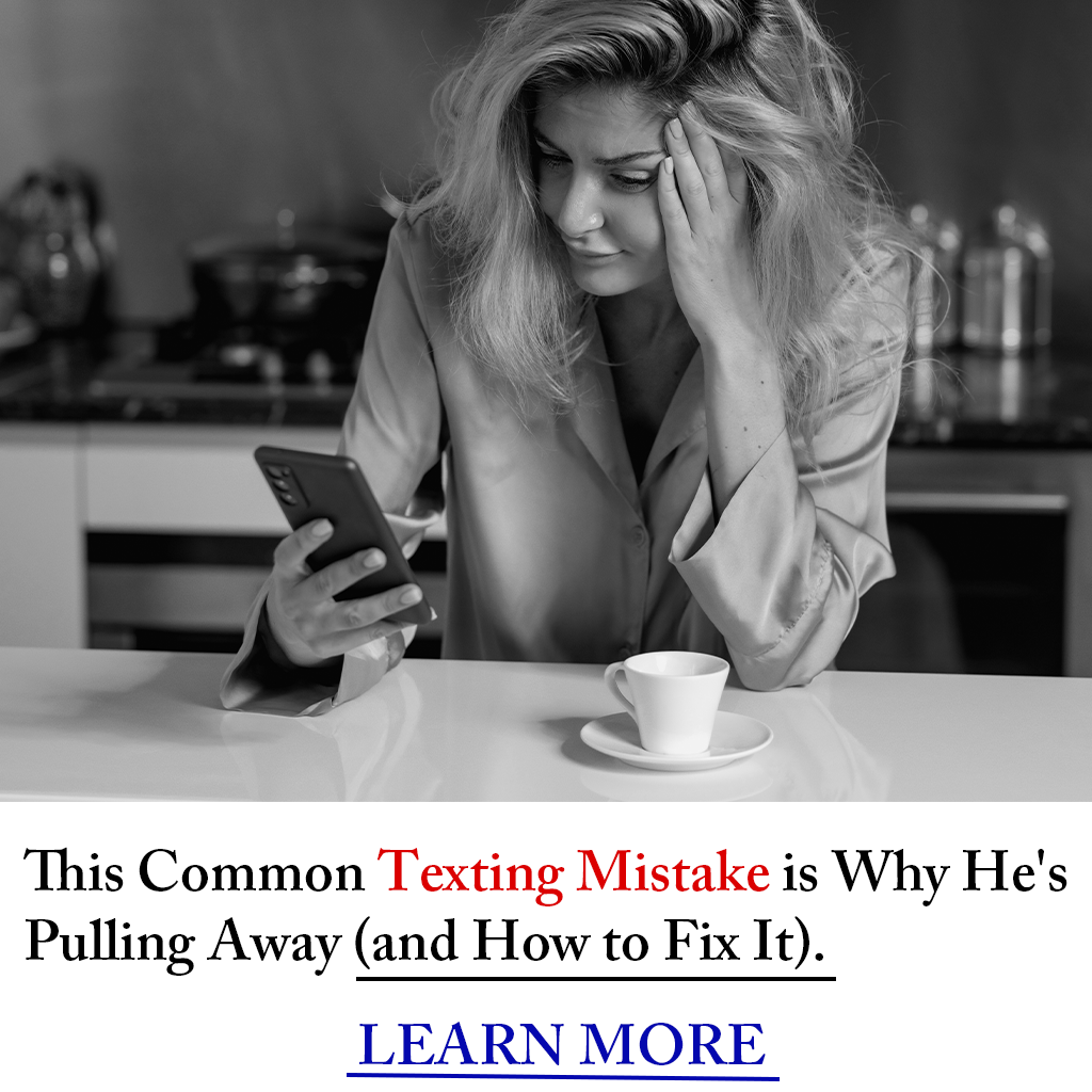 Woman smiling at phone — texting concept